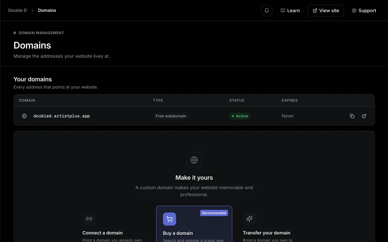 The Domains page: the artist's free Artistplus subdomain listed as active, with a panel below it to connect, buy or transfer a custom domain.